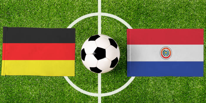Jugadores de las selecciones de fútbol de Alemania y Paraguay en un partido del Mundial 2026.