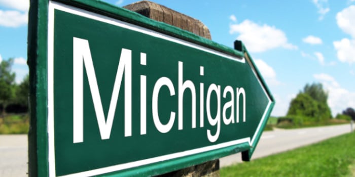 Ilustración de una ruleta de lotería con el logo de "Daily Spin to Win" y el estado de Michigan en el fondo.