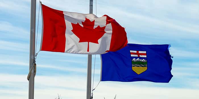 Mapa de Alberta, Canadá, con iconos de juegos de azar en línea simbolizando el lanzamiento del mercado regulado.